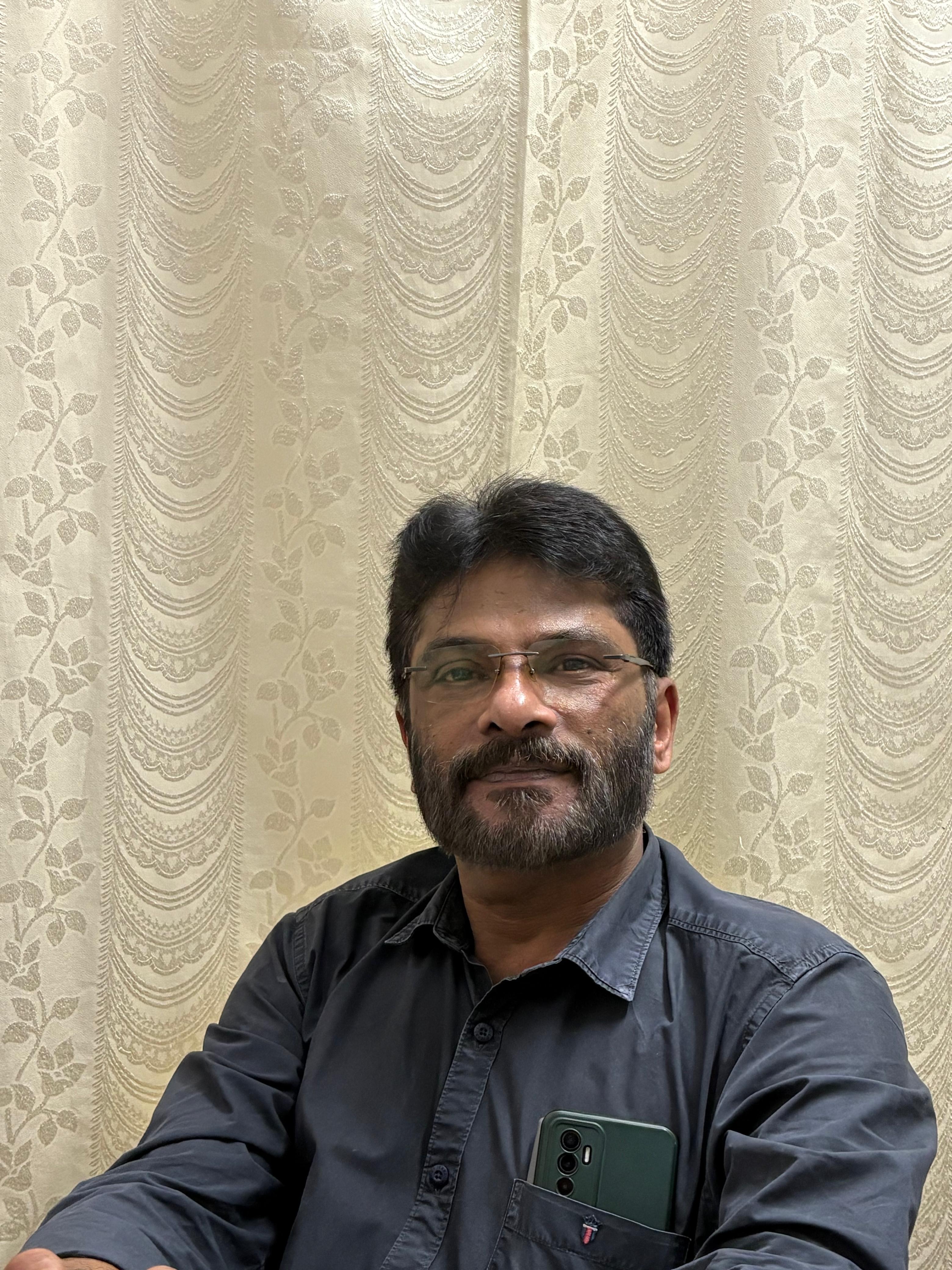 Dr.Tomi Mathew MBBS,MS consultant general surgeon 